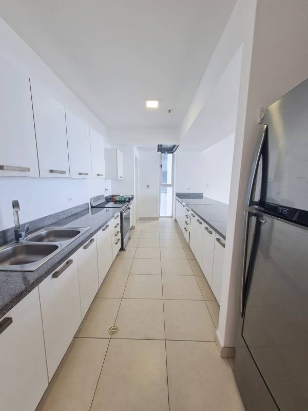 Bright living area with large windows offering breathtaking ocean views in PH Waters Panama