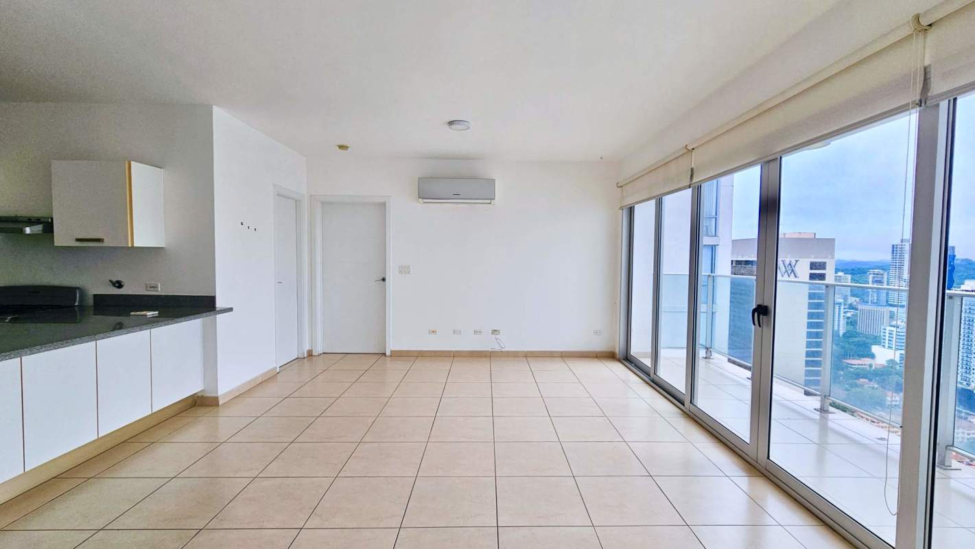 Modern kitchen with breakfast bar, granite and stainless appliances in PH Waters Panama City