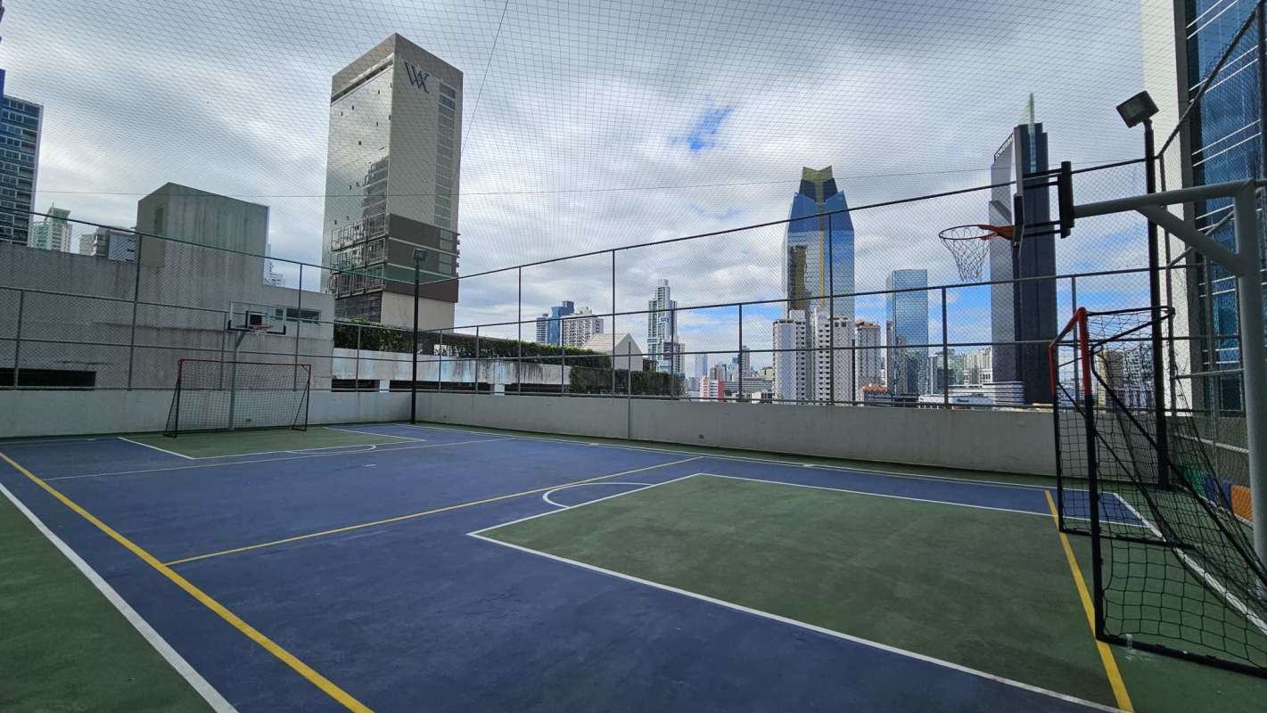 Rooftop multi-sport court overlooking city skyline in PH Waters Panama City