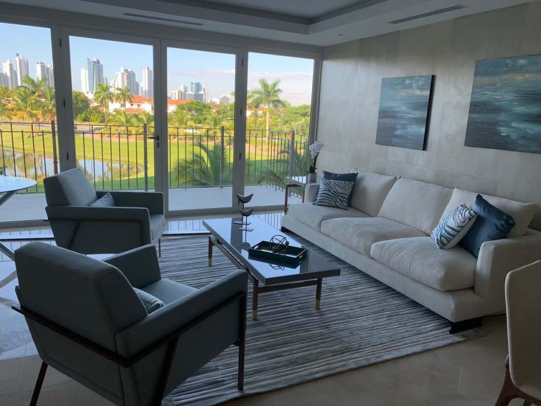 Modern kitchen with quartz counters, built-in appliances, marble floor in furnished apartment The Reserve Panama City