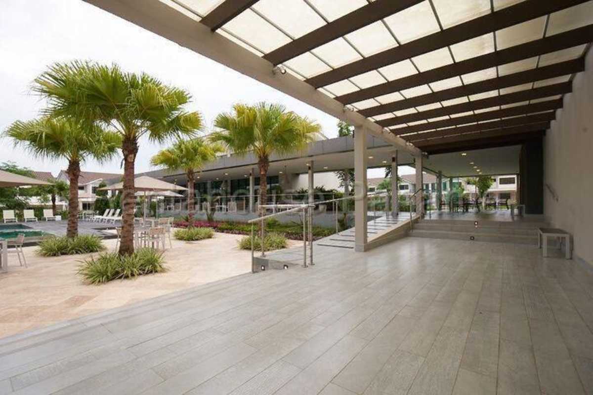 Balcony overlooking gardens and neighborhood PH Sierra Nevada Brisas del Golf Panama