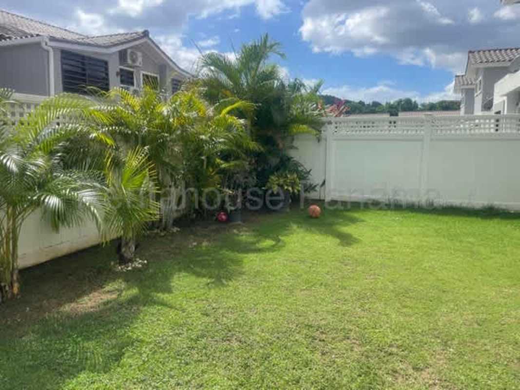 Modern open kitchen with granite counters and wood cabinetry PH Sierra Nevada Brisas del Golf Panama
