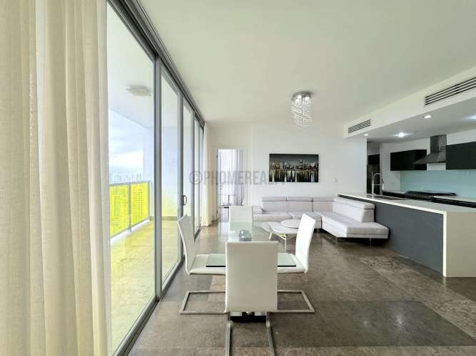 Luxury master suite with oceanfront windows at PH Vista del Este Panama City