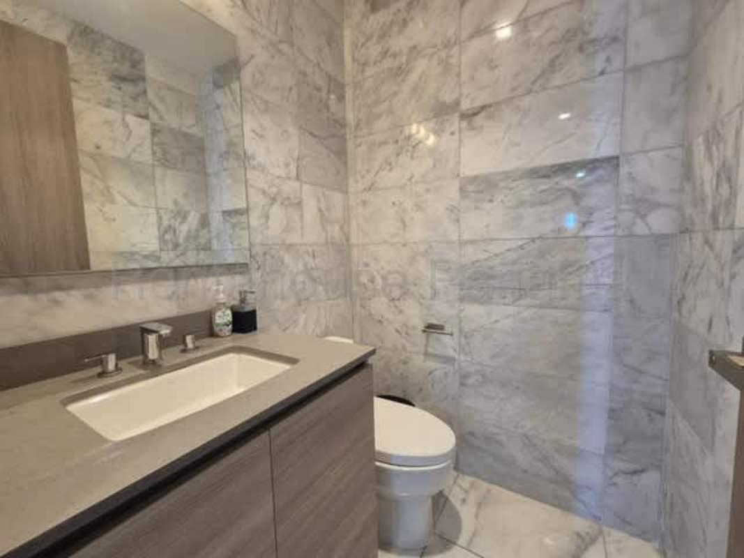 Fully equipped kitchen with center island granite counters PH Marina Bay Tower Panama City