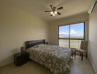 Beachfront infinity pool and jacuzzi with palm trees at Playa Malibu Gorgona
