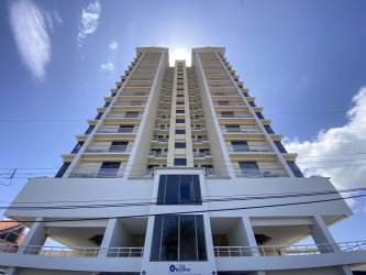 Modern mid-rise condo on Playa Malibu beachfront with balconies facing ocean