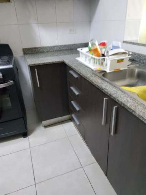 Bedroom with large window, ceiling fan, split AC PH El Mare 500 Edison Park Panama