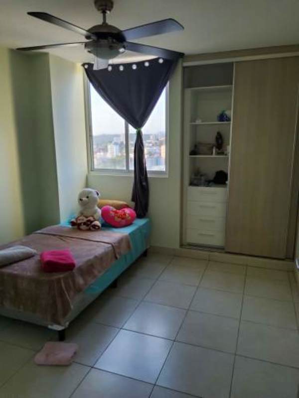Bedroom featuring built-in closet, AC, ceiling fan Edison Park Panama rental