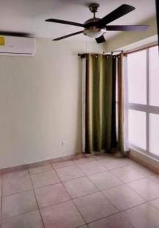 Secondary bedroom with split AC, ceiling fan, built-in closet in Edison Park Panama City