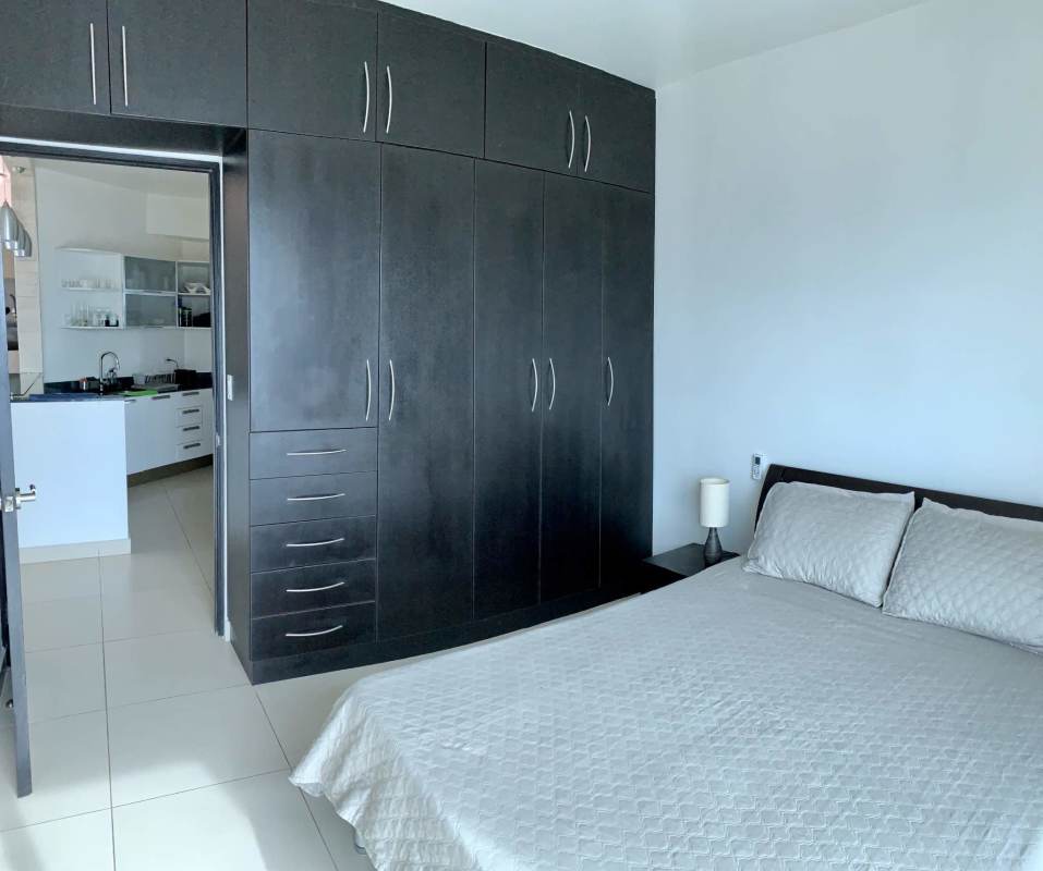 Modern bathroom with glass-enclosed shower and sink in PH Destiny Tower Panama