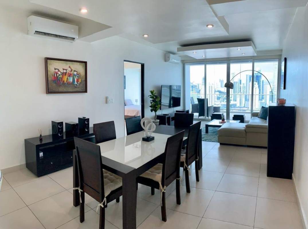 Bright living area with balcony access bay views in PH Destiny Tower Avenida Balboa Panama