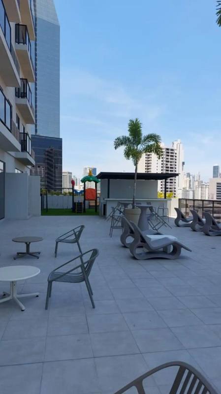 Outdoor social terrace with city skyline views at PH The Gray Panama