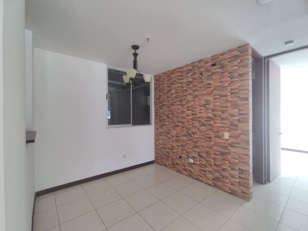 Contemporary living with brick accent wall, ceramic tiles PH Altavista Tower Panama