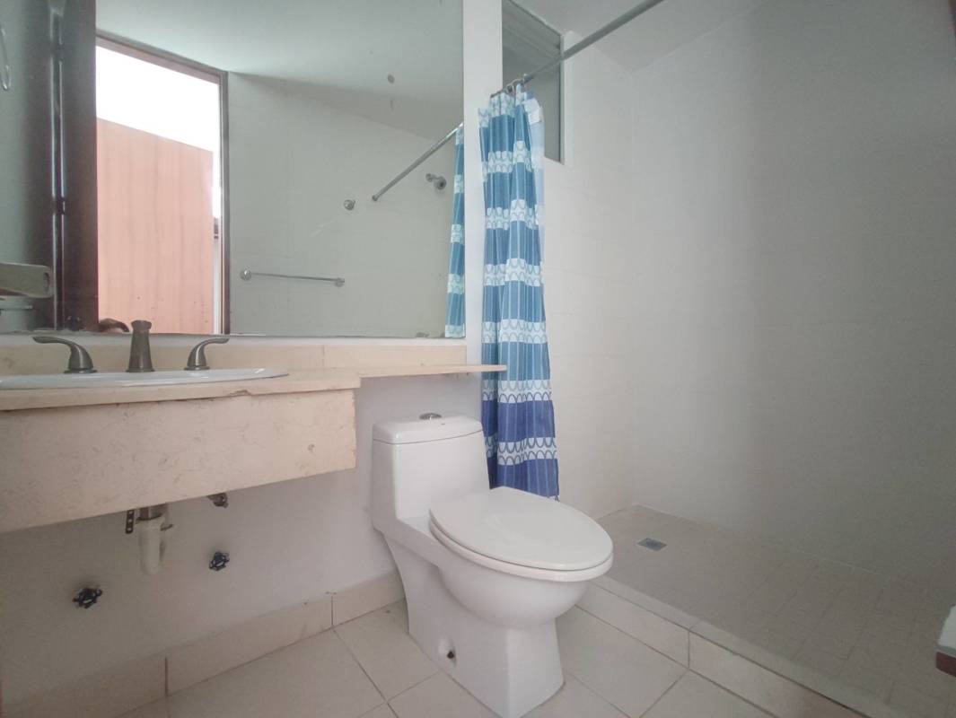 Contemporary bathroom with granite counter, large mirror, walk-in shower PH Altavista Tower Panama City