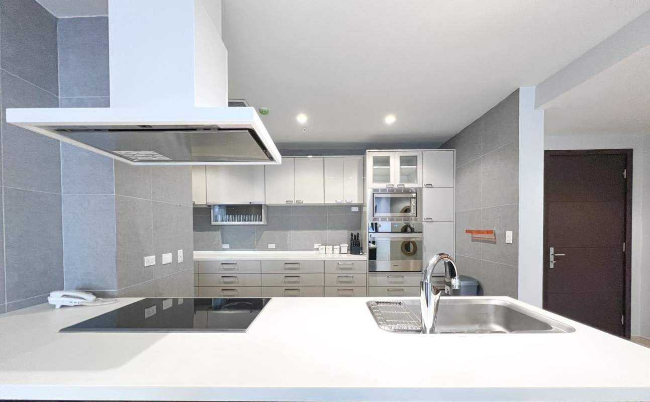 Fully equipped kitchen granite counters appliances in Grand Tower Punta Pacifica