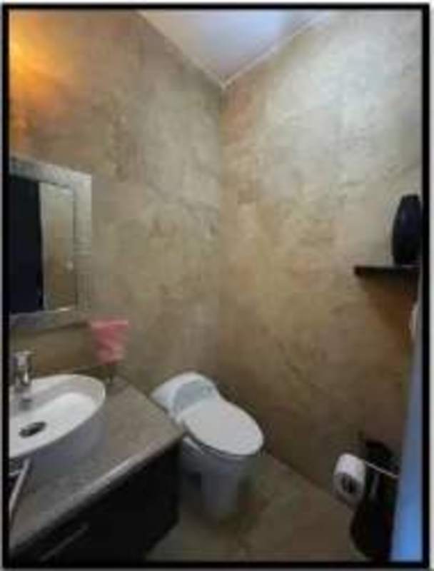 Luxury bathroom with modern fixtures and glass walk-in shower PH Pearl at the Sea Costa del Este Panama