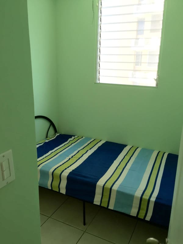 Bright second bedroom with closet and split AC in PH Via Porras San Francisco Panama Rental