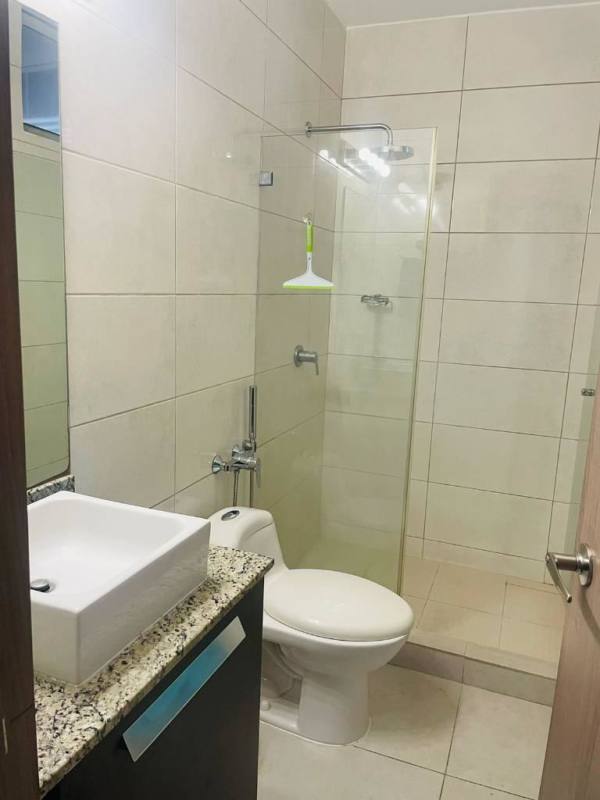 Modern kitchen with stainless steel appliances, granite counters, cupboards in PH El Cangrejo Terrace Panama