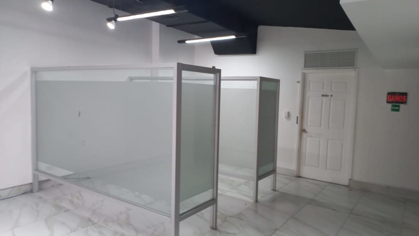 Commercial showroom with frosted partitions marble floor Via Porras Panama City