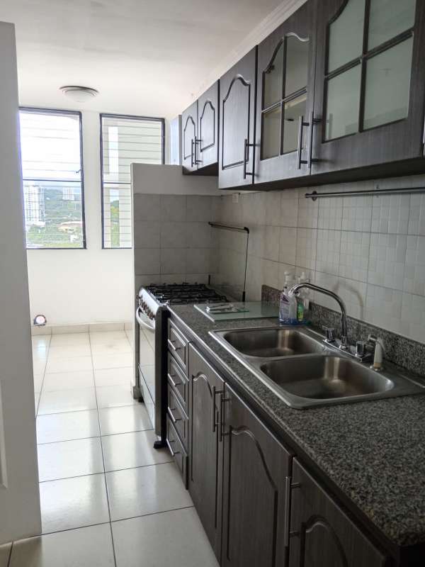 Modern kitchen with granite countertop, stainless sink, gas stove, windows PH La Loma Park Hato Pintado Panama