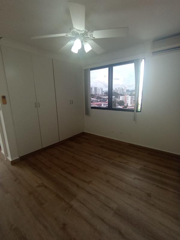 Balcony with protective netting city high rise skyline view PH La Loma Park Hato Pintado Panama