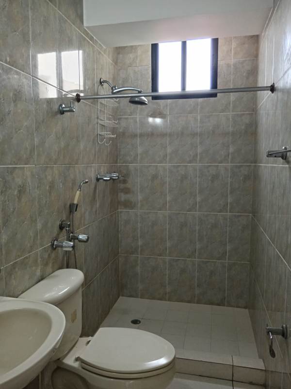 Functional bathroom ceramic tile walk-in shower sink toilet PH La Loma Park Panama
