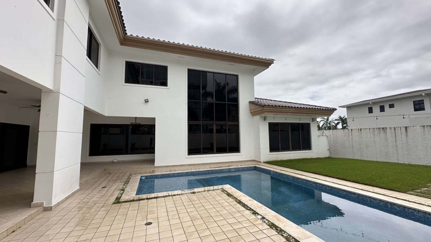 Contemporary two-story luxury house facade with large windows in Costa del Este Panama