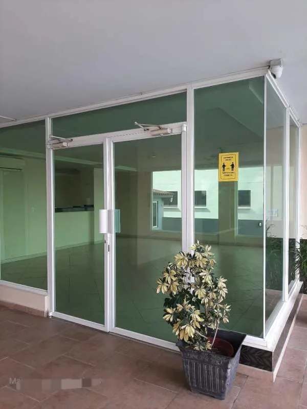 Main lobby entrance glass doors PH El Cangrejo Tower Panama City