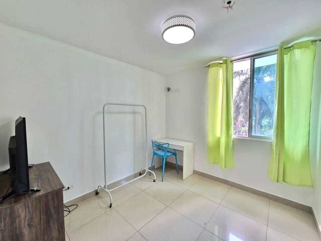 Bedroom with desk, built-in closet, window PH Green Park Condado del Rey Panama rental