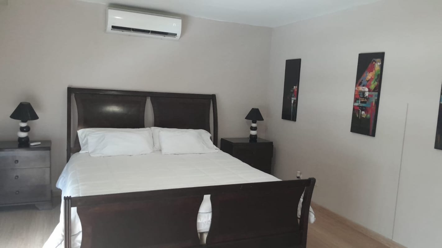 Modern bathroom with walk-in shower and vanity at PH Bayfront