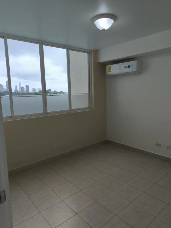 Kitchen with marble-look counters and cabinetry in Edison Park Panama for rent