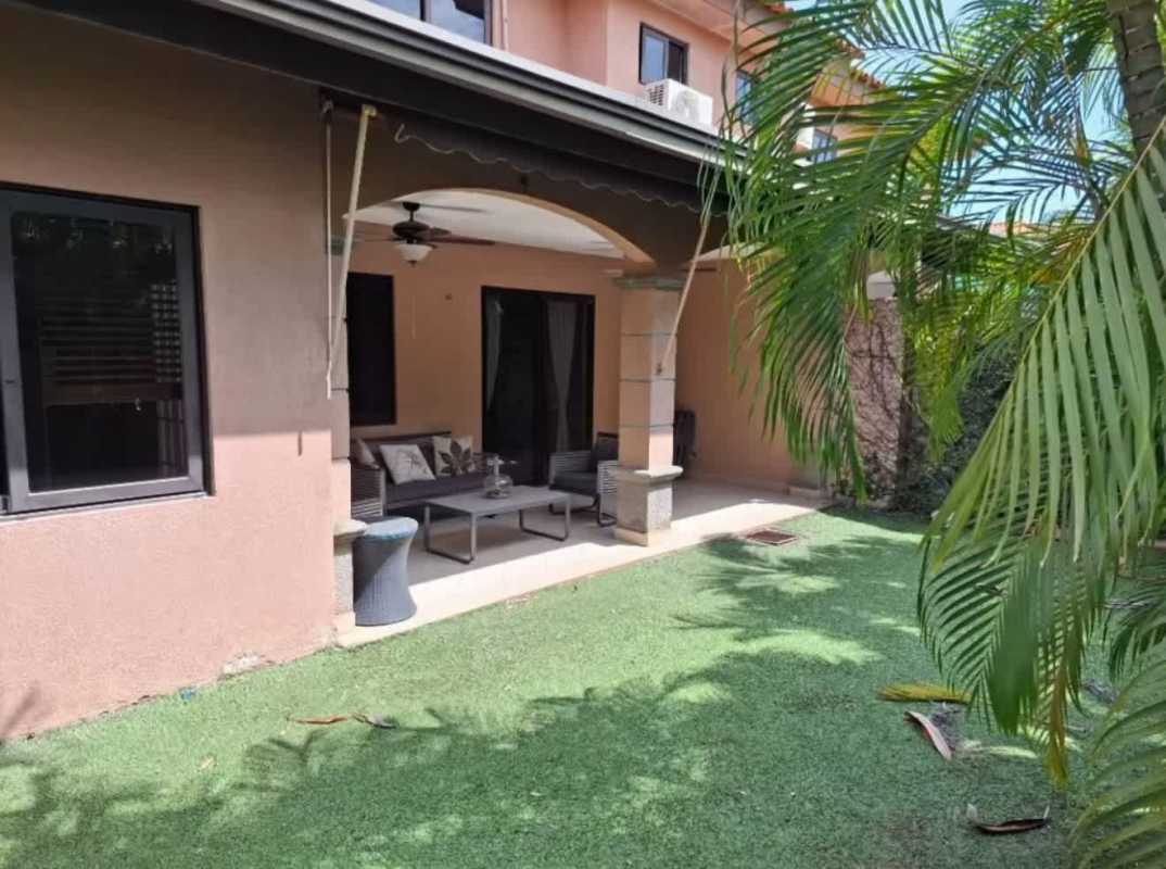 Covered patio with seating area garden view Versalles 1 Costa Sur