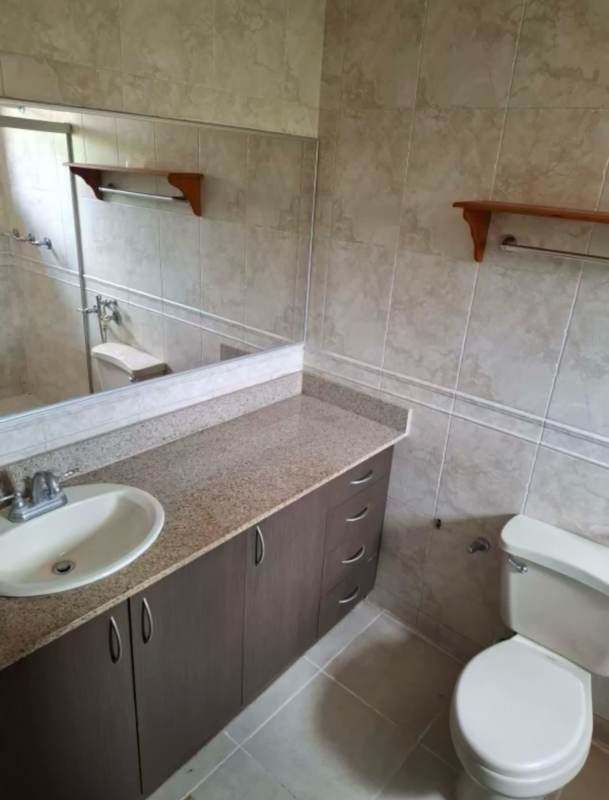 Contemporary bathroom with granite counter large mirror Versalles 1 Costa Sur Panama