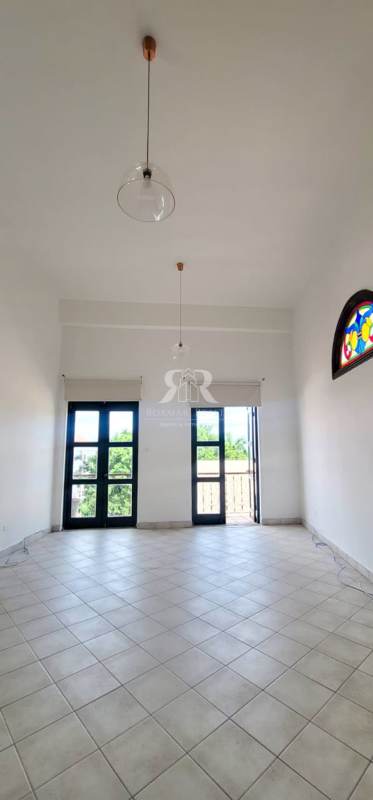 Spacious living room with stained glass window in Casco Viejo historic area