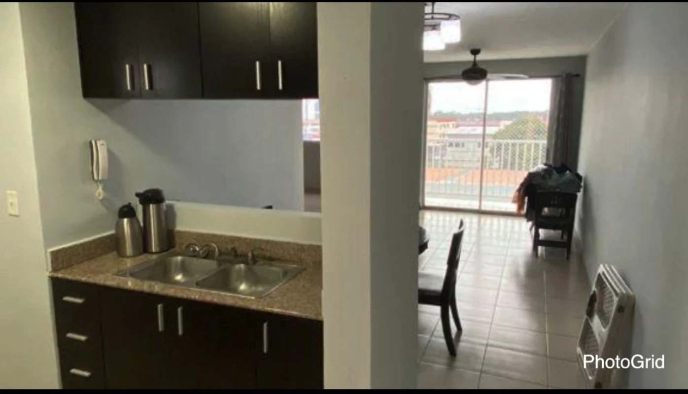 Living room with ceramic floors opening to balcony PH Rio Abajo Panama