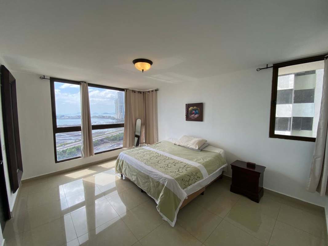 Bedroom with panoramic ocean view windows in PH San Francisco Bay Tower Panama