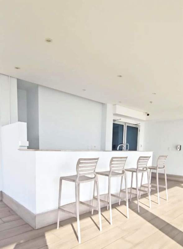 Fully equipped gym with modern machines and mirrors at PH Signature Point Panama