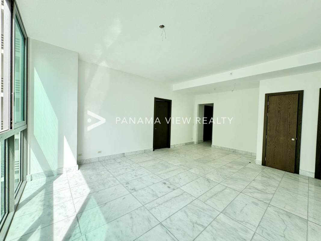 Large balcony with glass railing overlooking Pacific Ocean skyline from Sea Point Punta Paitilla