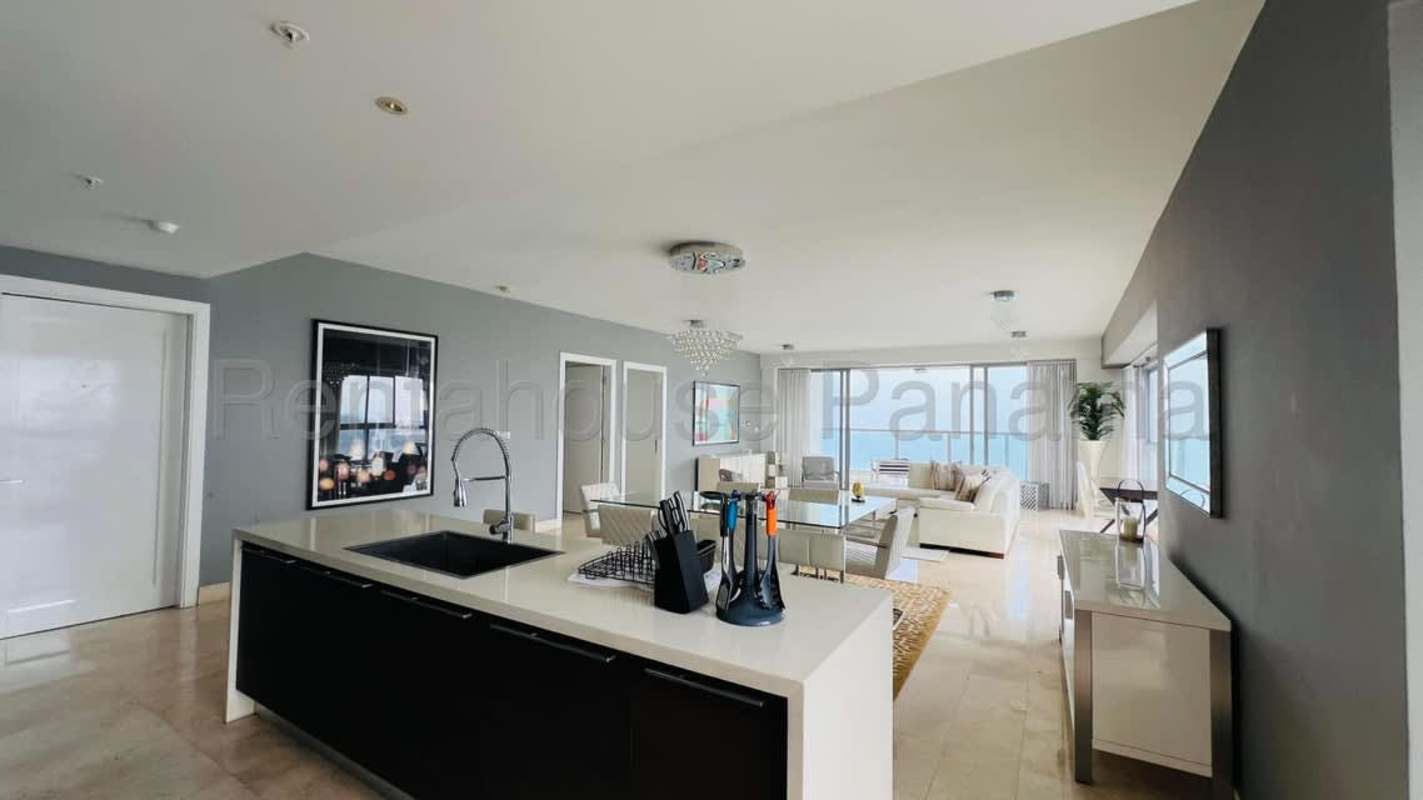 Spacious master bedroom floor-to-ceiling window panoramic Pacific view Yacht Club Penthouse Panama