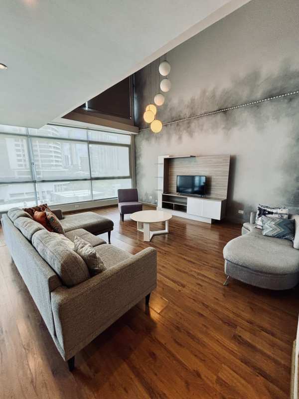 Bedroom with walk-in closet, en-suite bathroom, ocean view window in PH Bayfront loft