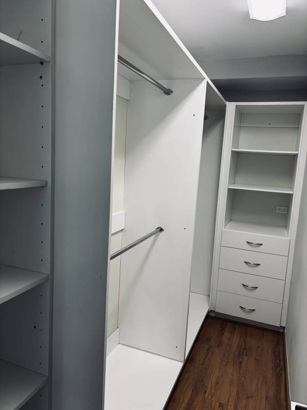 Bright loft living area with large bay windows and ocean views in PH Bayfront