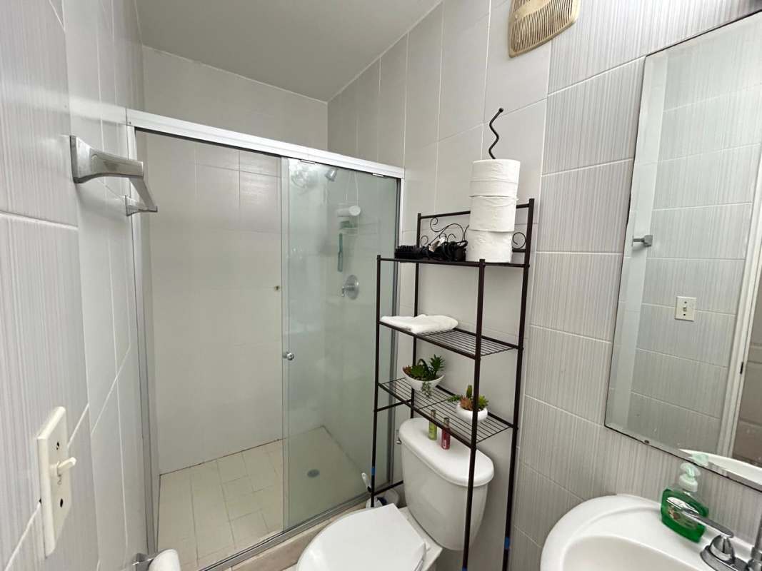 Gym with cardio equipment, mirrors and large windows at Vivendi Towers Edison Park Panama