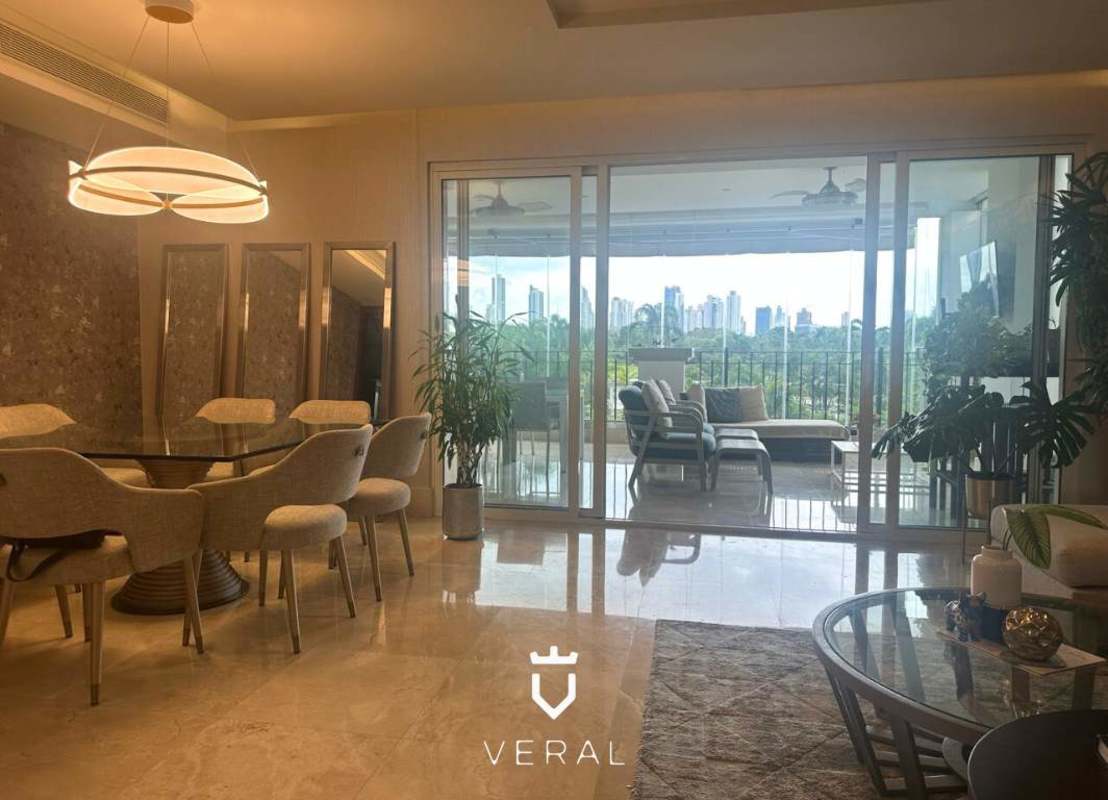 Elegant dining and living room with garden views in luxury apartment PH The Reserve Santa Maria Panama