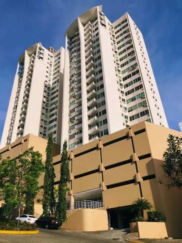 Exterior view of PH Majestic Gardens tower with balconies and entrance Panama