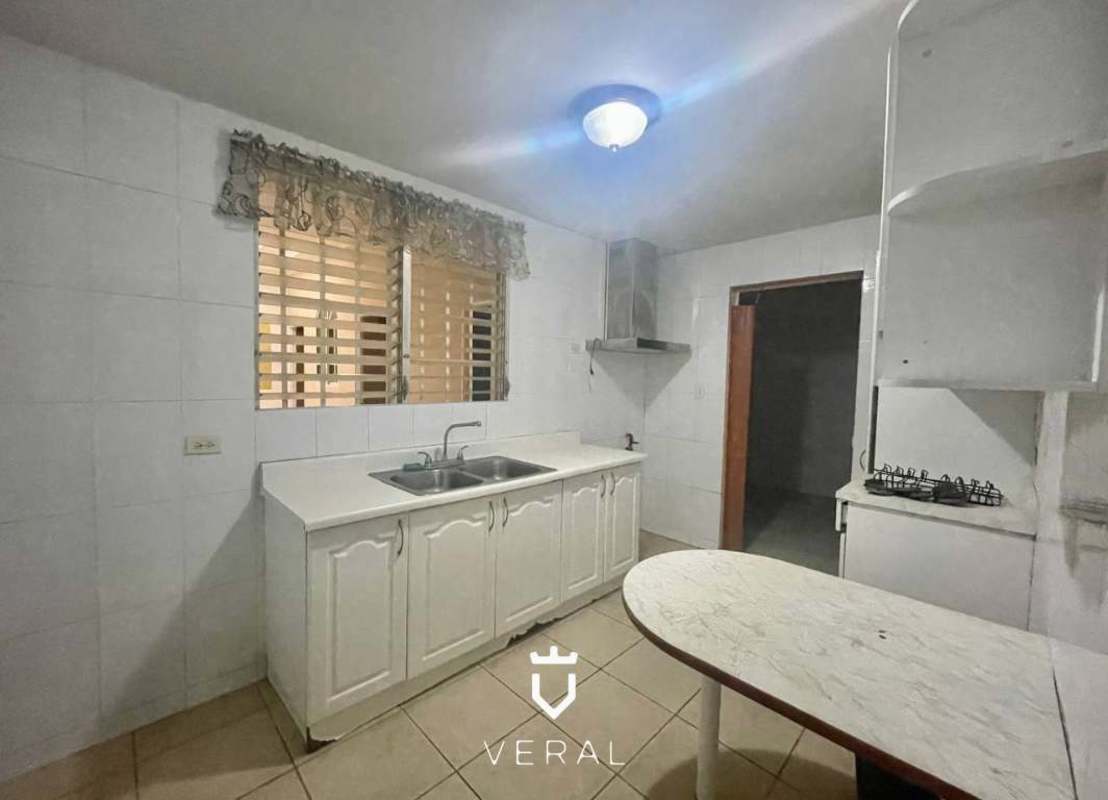 Tile kitchen with gas stove, sink and natural light Terrazas Brisas Panama