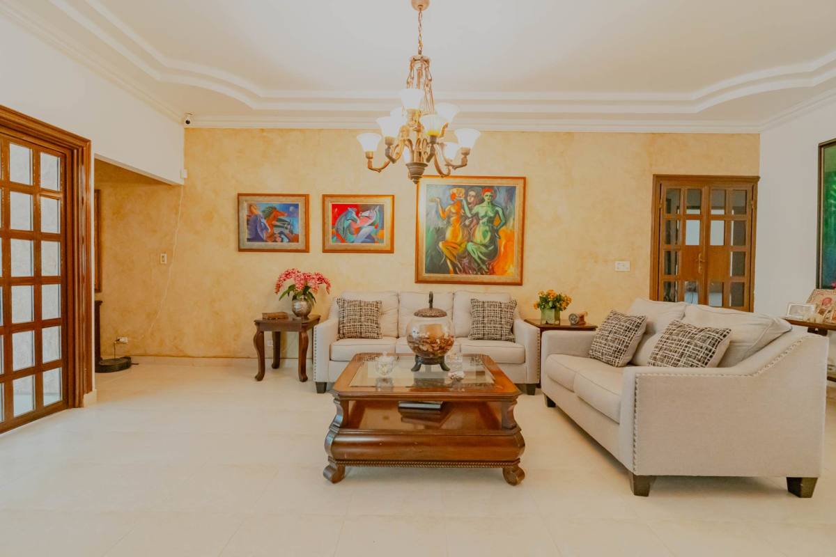 Bedroom featuring wood wardrobes and fan in La Loma residential Panama City