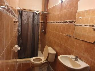 Bedroom with two twin beds AC closet country setting Pedasí Panama