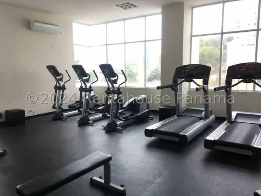 Hallway with neutral tiled flooring and white walls in PH Vivendi Towers Panama City