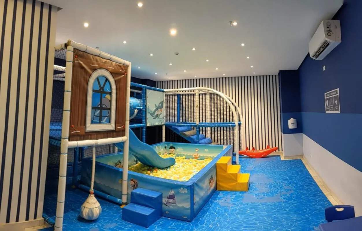 Indoor children's room with ball pit, slide, marine decor in PH Park City building Obarrio Panama