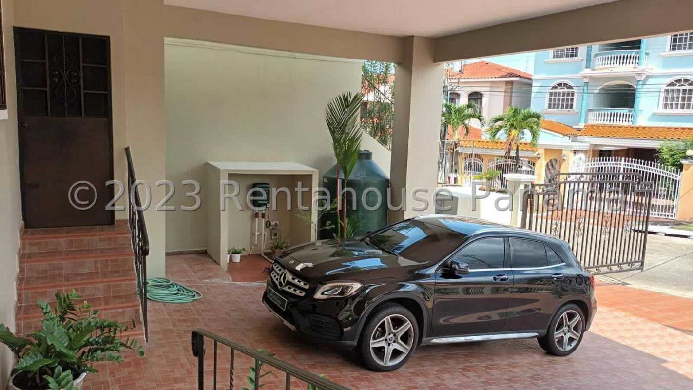 Covered parking and driveway in luxury gated home in Altos de Panamá community Panama City